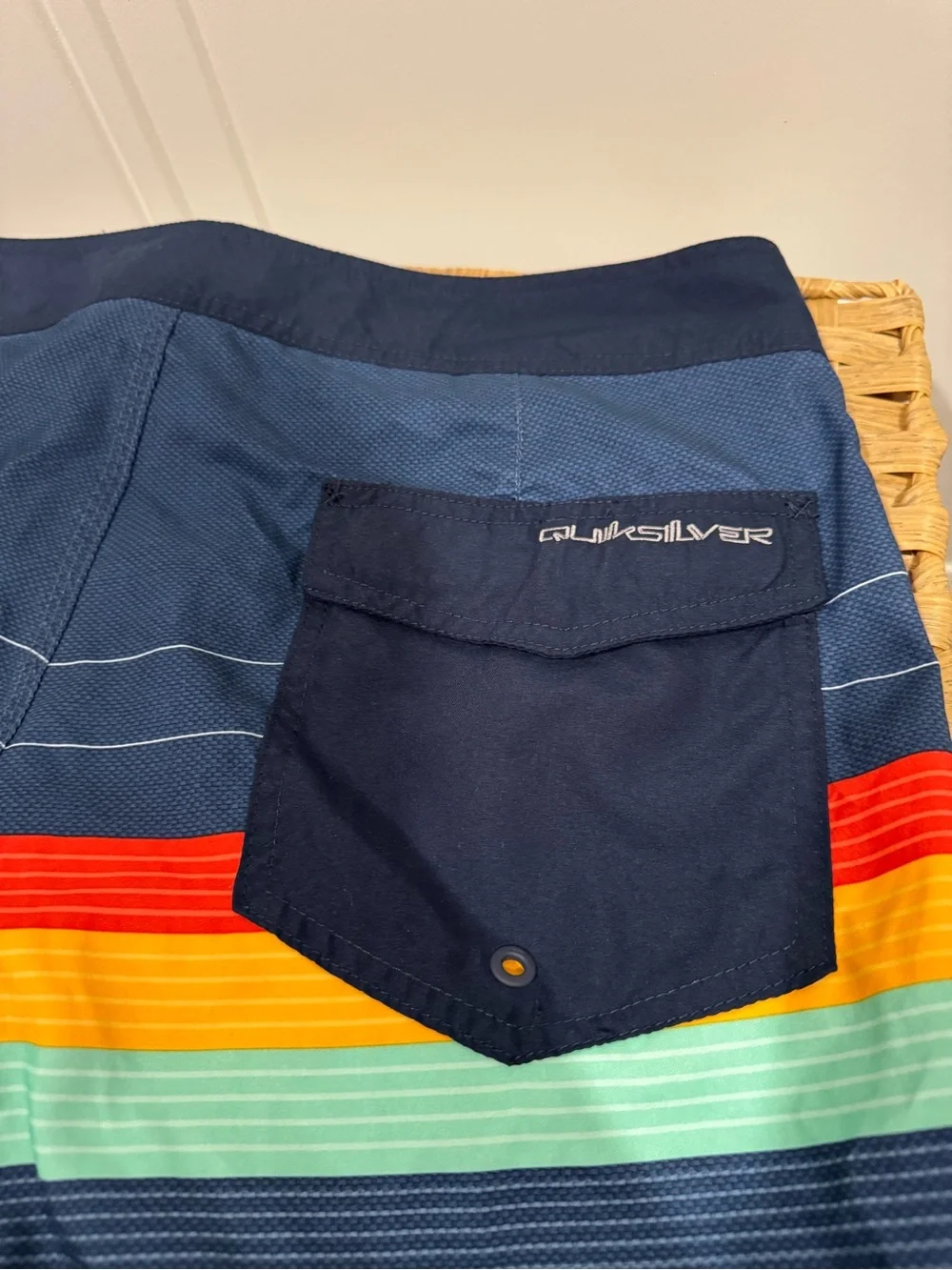 Quiksilver Men’s Navy Swim Board Shorts with Red, Orange, Yellow & Aqua Stripes